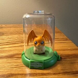 Digimon Patamon Mini Plastic Figurine in Small Domed Container Zag Toys.    EUC!